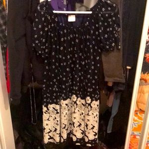 Just below knee loose fit peasant dress.